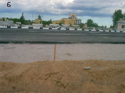 На месте бывшего переезда. Ещё неделю назад была только насыпь. Теперь асфальт.